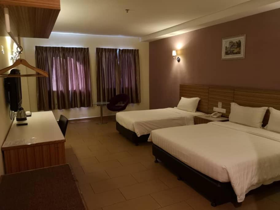 Grand Court Hotel Телук-Интан Экстерьер фото